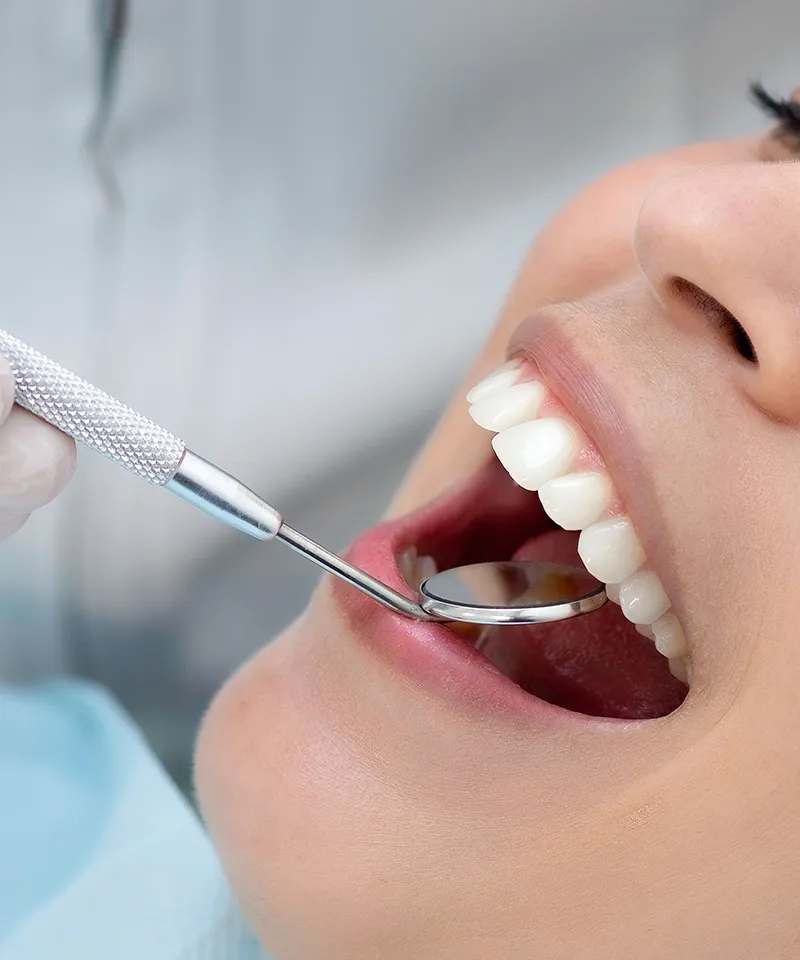 Dr Syed Misbah, dentist in Kashmir, treating a patient
